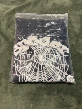 OG black Sp5der hoodie colors White/black unused with its own bag size medium.